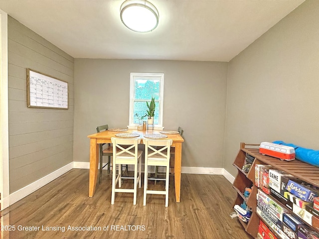 2215 Haslett Rd, East Lansing, MI 48823 - dining space featuring wood finished floors and baseboards