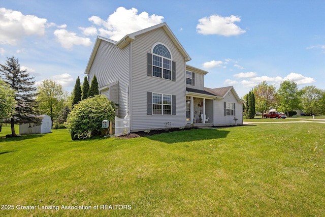 3795 Kirkland Ridge Dr, Holt, MI 48842 - traditional-style home with a front yard, a storage shed, and an outdoor structure