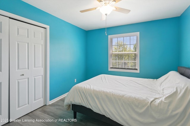 3795 Kirkland Ridge Dr, Holt, MI 48842 - bedroom featuring wood finished floors, baseboards, and a ceiling fan
