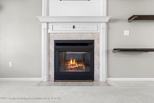 5859 Printemp Dr, East Lansing, MI 48823 - detailed view of carpet floors, a tiled fireplace, and baseboards