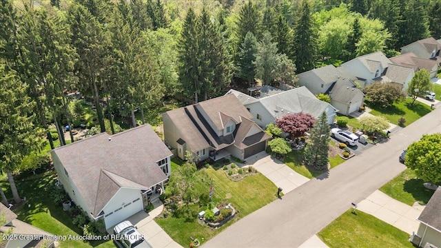 5859 Printemp Dr, East Lansing, MI 48823 - aerial view of residential area with a heavily wooded area