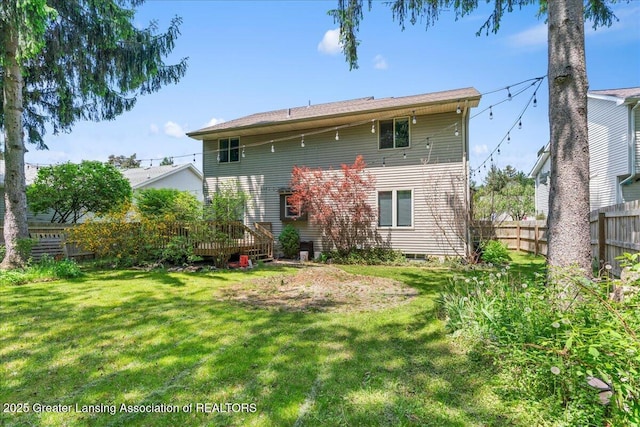 5859 Printemp Dr, East Lansing, MI 48823 - back of house featuring a deck