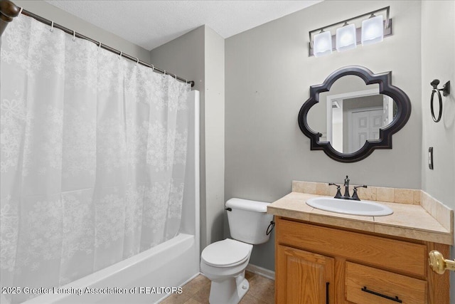 5859 Printemp Dr, East Lansing, MI 48823 - bathroom with tile patterned floors, toilet, a textured ceiling, vanity, and shower / tub combo with curtain