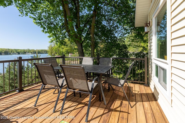 6391 Lakeshore Dr, Lakeview, MI 48850 - deck featuring a water view and outdoor dining space