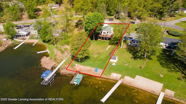 6391 Lakeshore Dr, Lakeview, MI 48850 - aerial view of residential area featuring property boundaries highlighted and a nearby body of water