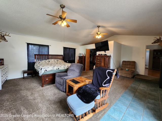 136 N Chestnut St, Owosso, MI 48867 - bedroom with lofted ceiling, a textured ceiling, carpet, and a ceiling fan