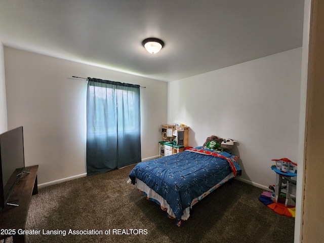 136 N Chestnut St, Owosso, MI 48867 - bedroom with carpet and baseboards
