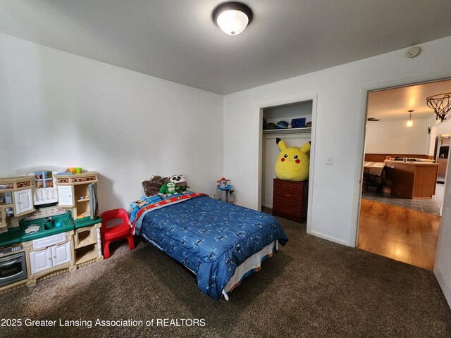 136 N Chestnut St, Owosso, MI 48867 - carpeted bedroom with a closet
