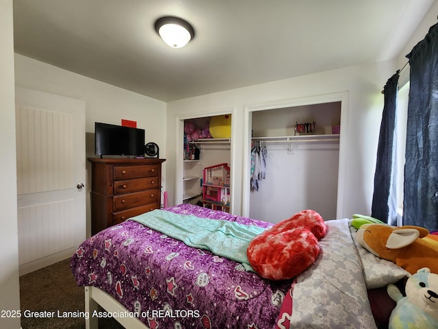 136 N Chestnut St, Owosso, MI 48867 - bedroom featuring multiple closets and carpet floors