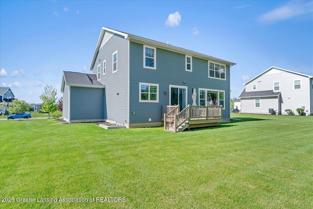 4150 Stillbrook Ln, Dewitt, MI 48820 - back of property featuring a deck and a yard