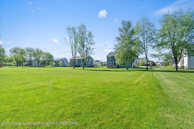 4150 Stillbrook Ln, Dewitt, MI 48820 - view of green lawn featuring a residential view