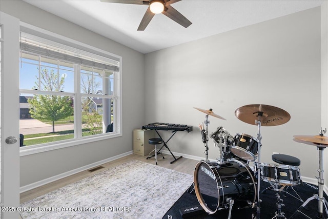 4150 Stillbrook Ln, Dewitt, MI 48820 - misc room featuring a ceiling fan, baseboards, and wood finished floors