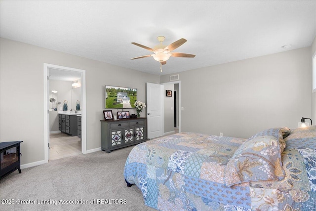 4150 Stillbrook Ln, Dewitt, MI 48820 - bedroom with carpet floors, baseboards, a ceiling fan, and ensuite bath
