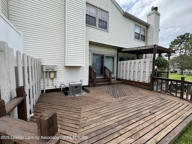 7436 Creekside Dr Unit 10, Lansing, MI 48917 - wooden terrace with central AC unit