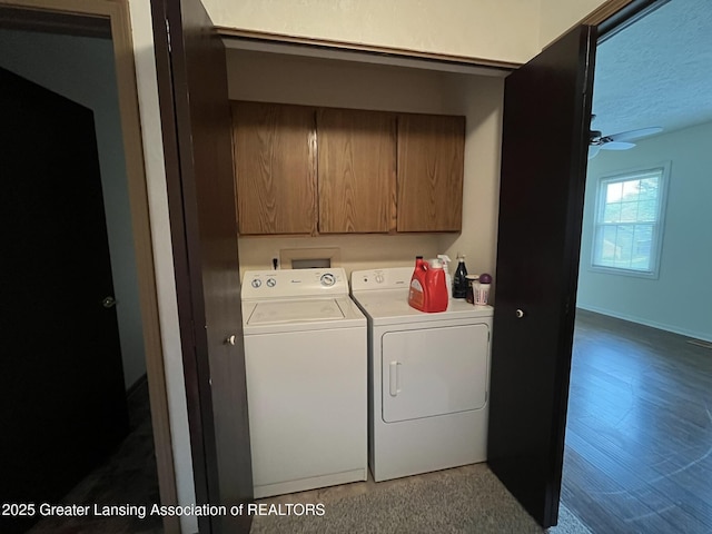 7436 Creekside Dr Unit 10, Lansing, MI 48917 - laundry area with washing machine and dryer, cabinet space, ceiling fan, and wood finished floors