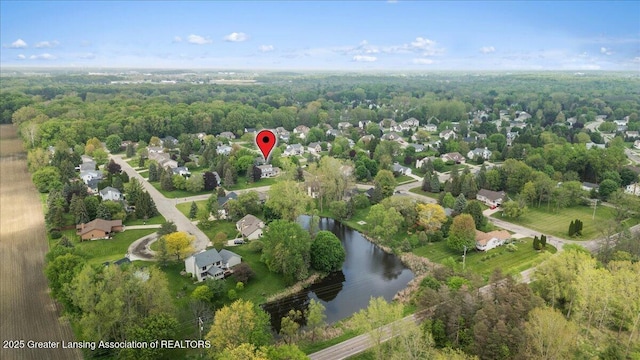 3720 Lott Ave, Holt, MI 48842 - aerial view of property and surrounding area with a nearby body of water and a forest