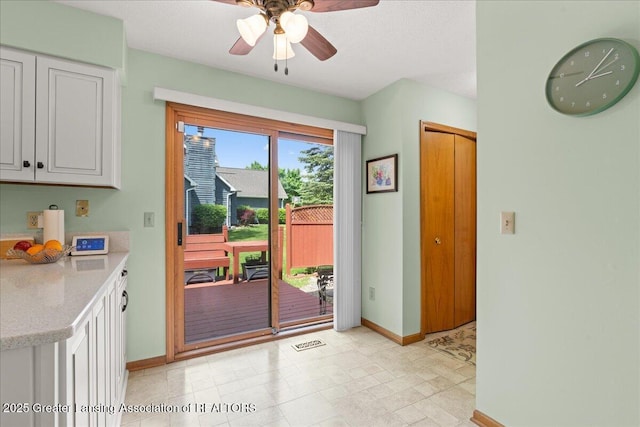 3720 Lott Ave, Holt, MI 48842 - entryway featuring baseboards and ceiling fan