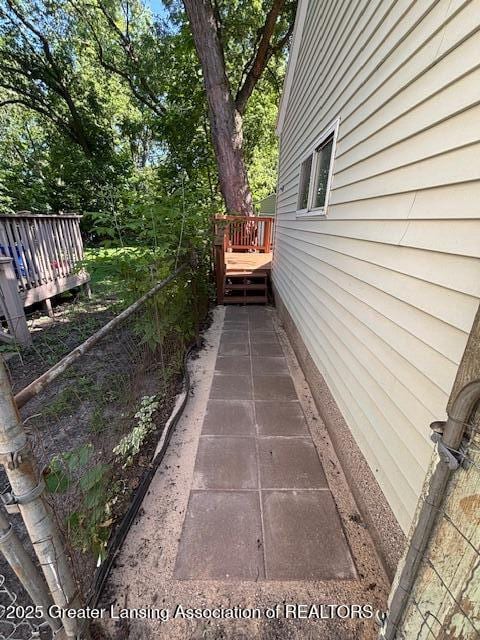 704 Mckim Ave, Lansing, MI 48910 - view of patio / terrace featuring a deck