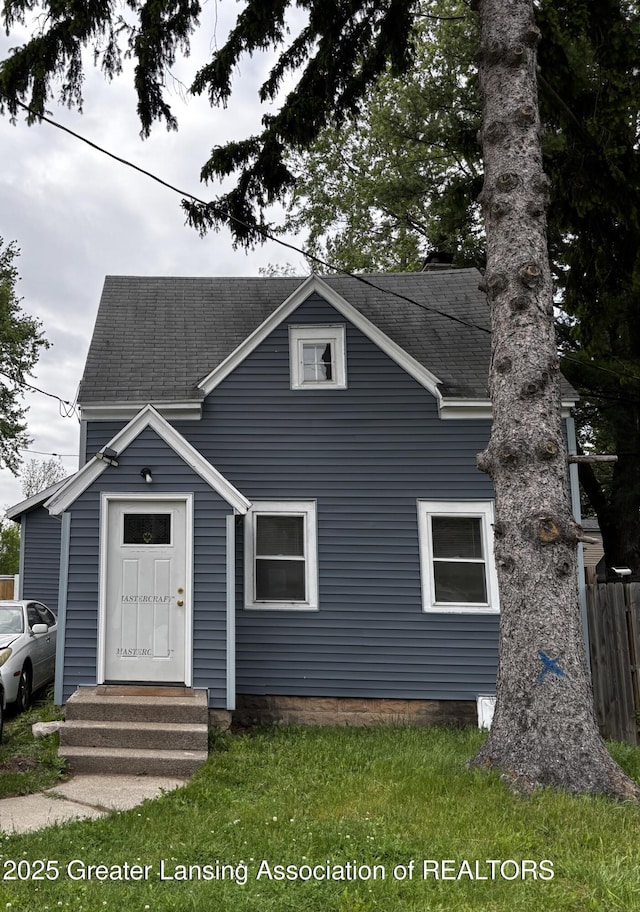 1916 W Jolly Rd, Lansing, MI 48910 - view of front of property featuring roof with shingles