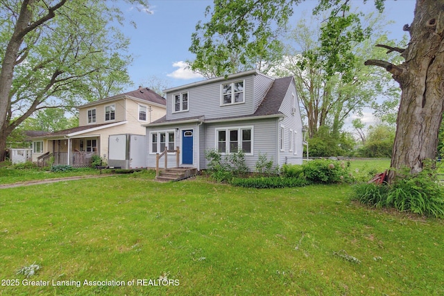 5104 Old Lansing Rd, Lansing, MI 48917 - view of front of property featuring a front lawn