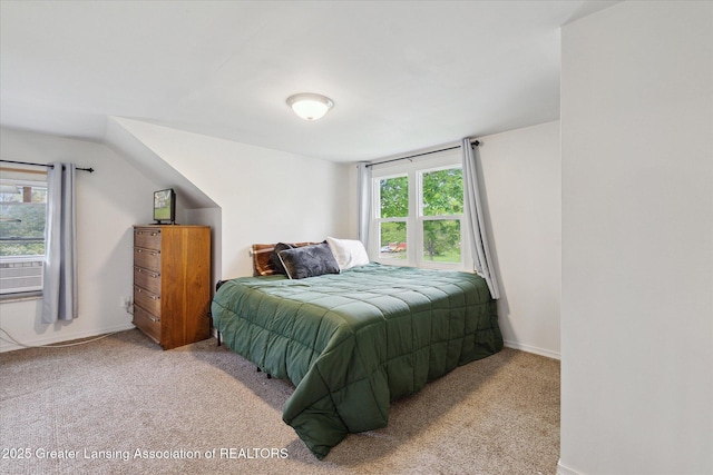 5104 Old Lansing Rd, Lansing, MI 48917 - bedroom with carpet flooring, baseboards, and cooling unit