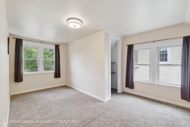5104 Old Lansing Rd, Lansing, MI 48917 - empty room with carpet floors and baseboards