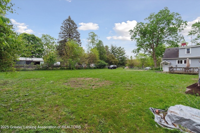 5104 Old Lansing Rd, Lansing, MI 48917 - view of yard with a deck