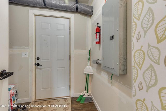 4614 Addison Rd, Lansing, MI 48917 - entryway with baseboards, electric panel, and wood finished floors