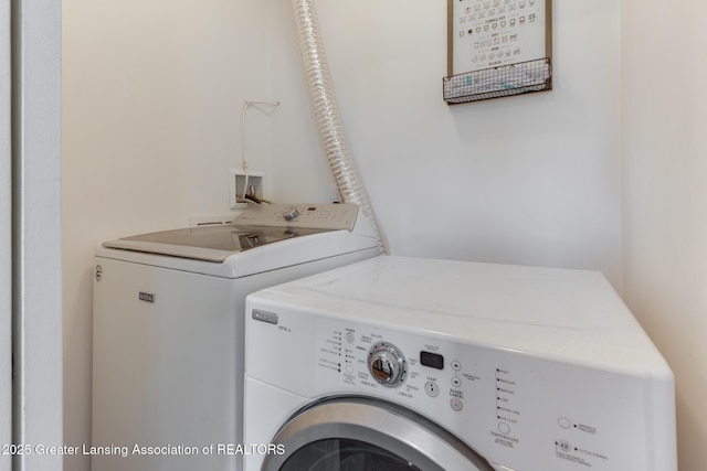 4614 Addison Rd, Lansing, MI 48917 - washroom featuring washing machine and dryer