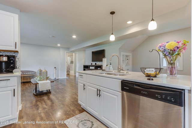 4614 Addison Rd, Lansing, MI 48917 - kitchen with dishwasher, a sink, white cabinets, dark wood-style flooring, and recessed lighting