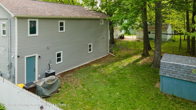 4614 Addison Rd, Lansing, MI 48917 - view of home's exterior with central AC