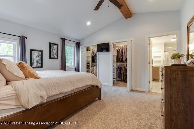 4614 Addison Rd, Lansing, MI 48917 - bedroom featuring multiple windows, light carpet, recessed lighting, ensuite bath, and a walk in closet