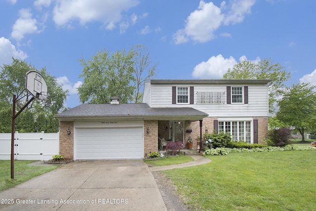 3733 Colchester Rd, Lansing, MI 48906 - traditional-style home featuring brick siding, concrete driveway, an attached garage, and a gate