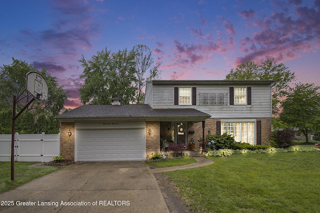 3733 Colchester Rd, Lansing, MI 48906 - traditional home with brick siding, driveway, a garage, a gate, and a porch