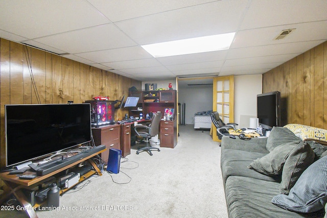3733 Colchester Rd, Lansing, MI 48906 - office space with wooden walls, light colored carpet, and a drop ceiling