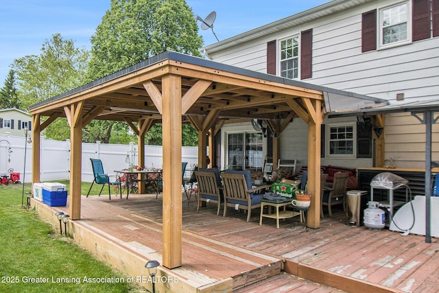 3733 Colchester Rd, Lansing, MI 48906 - deck with outdoor dining area and a gazebo