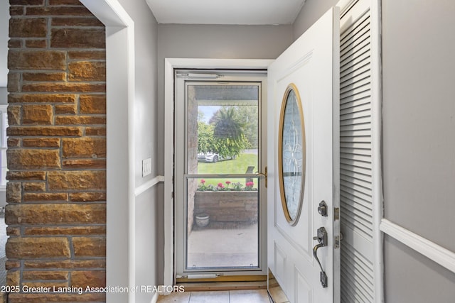 1111 Battle Creek Rd, Charlotte, MI 48813 - view of tiled foyer entrance