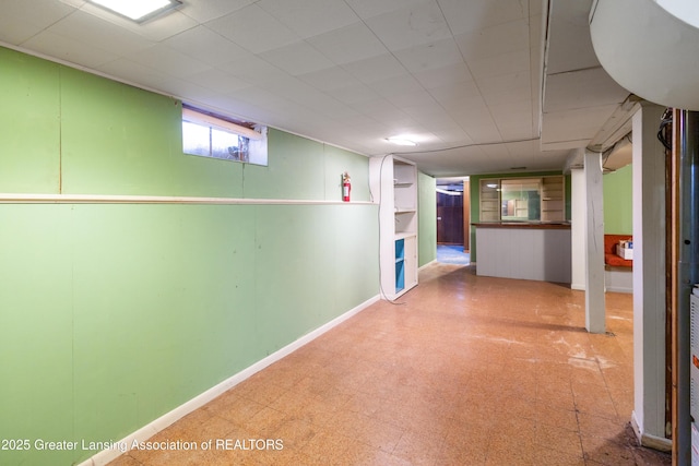 1111 Battle Creek Rd, Charlotte, MI 48813 - hall featuring tile patterned floors and baseboards