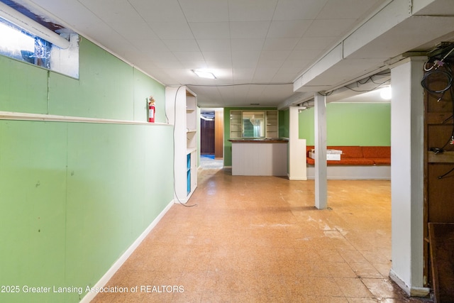 1111 Battle Creek Rd, Charlotte, MI 48813 - hallway with tile patterned floors