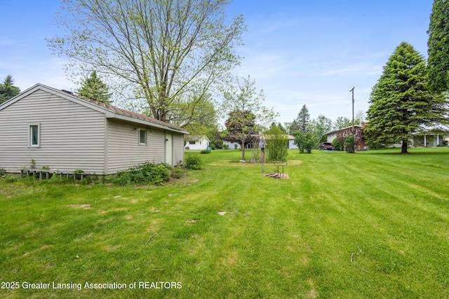 1111 Battle Creek Rd, Charlotte, MI 48813 - view of green lawn