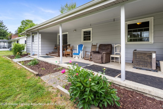 1111 Battle Creek Rd, Charlotte, MI 48813 - view of patio with central AC