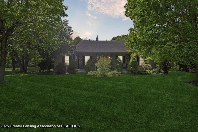 1435 Epley Rd, Williamston, MI 48895 - view of front of home featuring a front yard