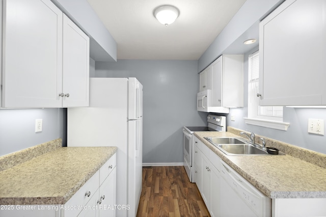 6215 Beechfield Dr, Lansing, MI 48911 - kitchen featuring white appliances, a sink, dark wood-style flooring, and light countertops