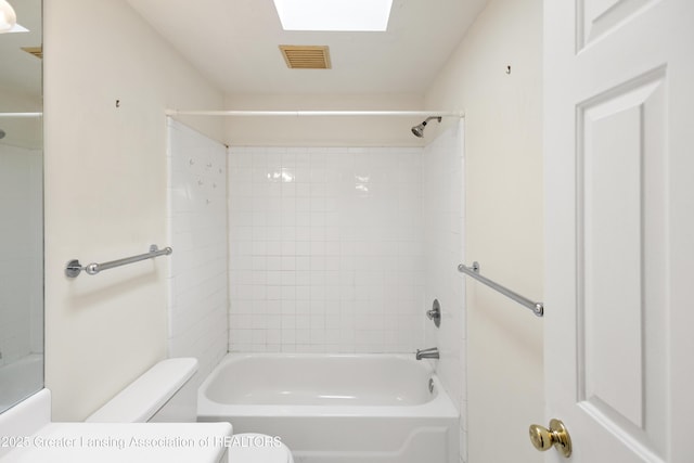 6215 Beechfield Dr, Lansing, MI 48911 - bathroom featuring toilet and shower / bath combination