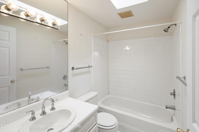 6215 Beechfield Dr, Lansing, MI 48911 - full bathroom featuring toilet, vanity, and bathing tub / shower combination