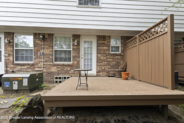 6215 Beechfield Dr, Lansing, MI 48911 - entrance to property with a deck