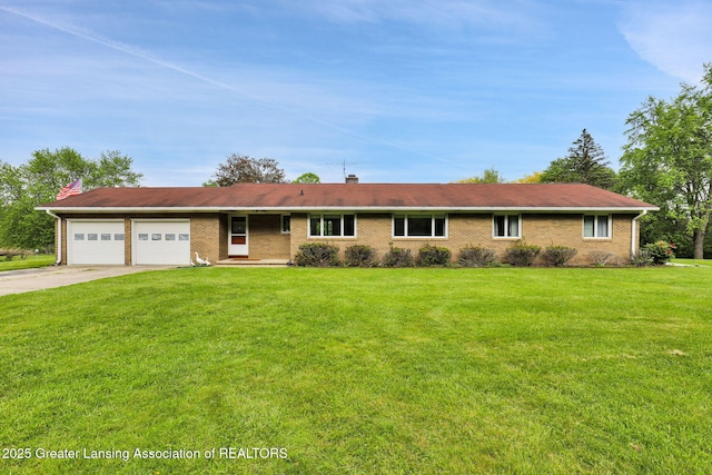 847 N Waverly Rd, Dimondale, MI 48821 - ranch-style home with an attached garage, driveway, a front lawn, brick siding, and a chimney