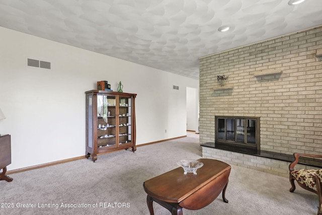 847 N Waverly Rd, Dimondale, MI 48821 - carpeted living room featuring baseboards and a fireplace