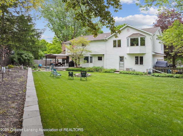 1866 Birchwood Dr, Okemos, MI 48864 - rear view of property featuring a gazebo and a patio area