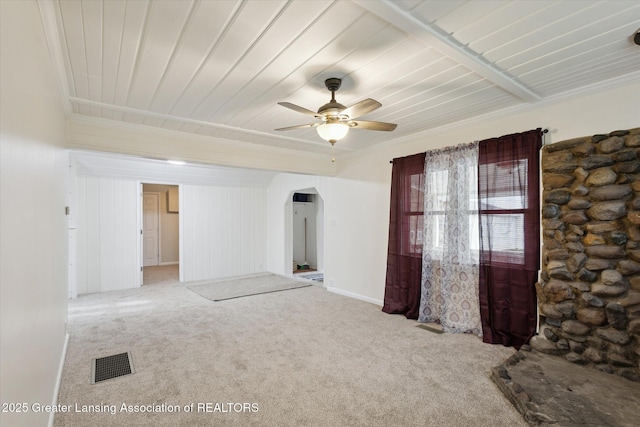1900 Kaplan St, Lansing, MI 48917 - carpeted spare room featuring arched walkways, ceiling fan, and crown molding